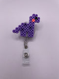 Purple Dino Badge Reel